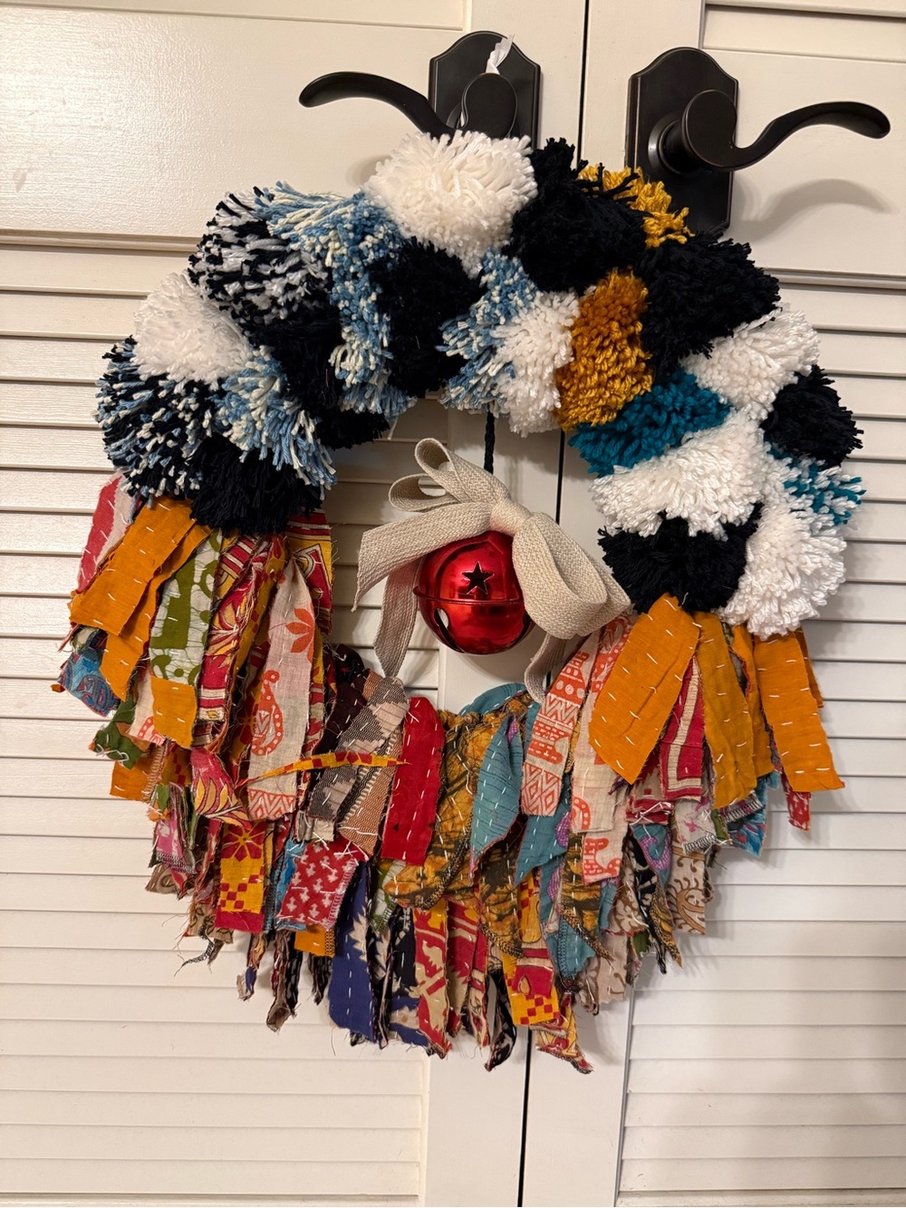Handmade Multicolor Holiday Pom-Pom and Fabric Wreath with Red Bell